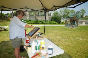 Artiste peintre dans le vieux Saint-Jean